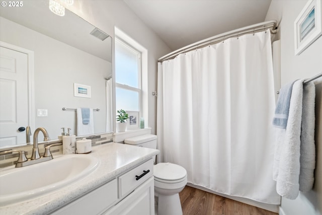 1686 NE 27th Ter, Gresham, OR 97030 - full bath featuring vanity, wood finished floors, and a shower with curtain