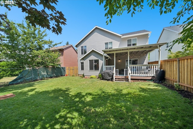 1686 NE 27th Ter, Gresham, OR 97030 - back of house featuring a fenced backyard and a wooden deck