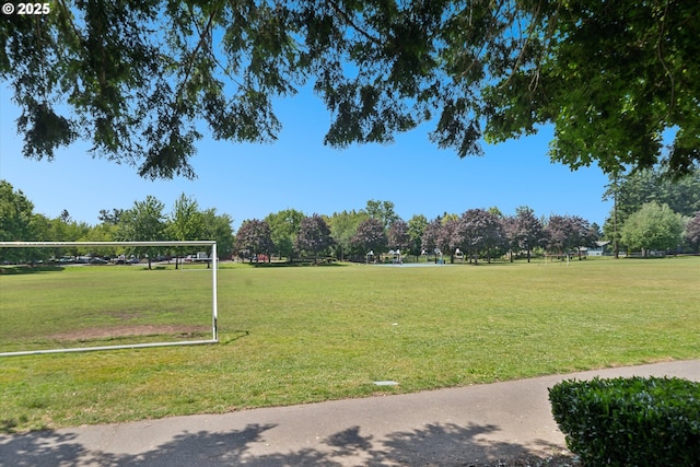 1686 NE 27th Ter, Gresham, OR 97030 - surrounding community with volleyball court and view of wooded area