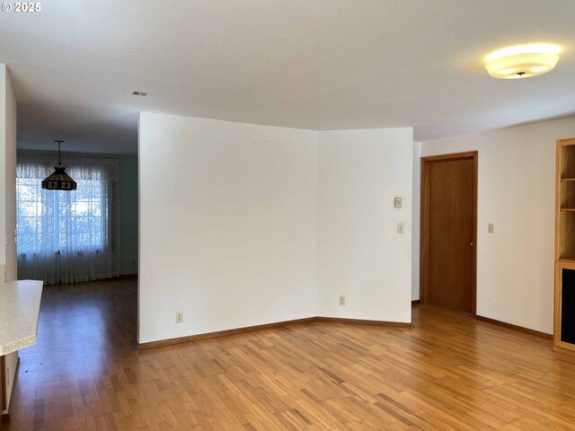 4040 Munsel Creek Dr, Florence, OR 97439 - spare room with light wood finished floors and baseboards