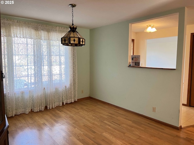 4040 Munsel Creek Dr, Florence, OR 97439 - empty room featuring wood finished floors and baseboards