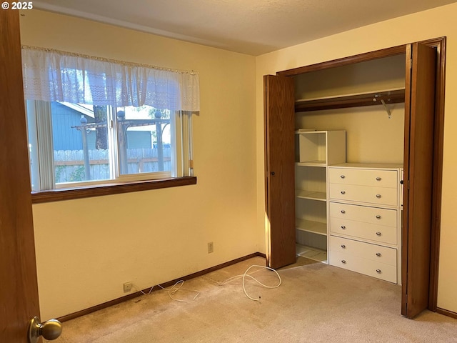 4040 Munsel Creek Dr, Florence, OR 97439 - unfurnished bedroom with carpet, a closet, and baseboards
