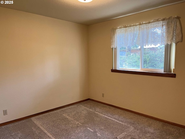 4040 Munsel Creek Dr, Florence, OR 97439 - empty room featuring carpet floors and baseboards