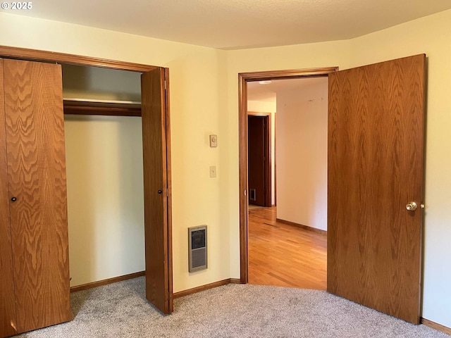4040 Munsel Creek Dr, Florence, OR 97439 - unfurnished bedroom with carpet floors, a closet, heating unit, and baseboards