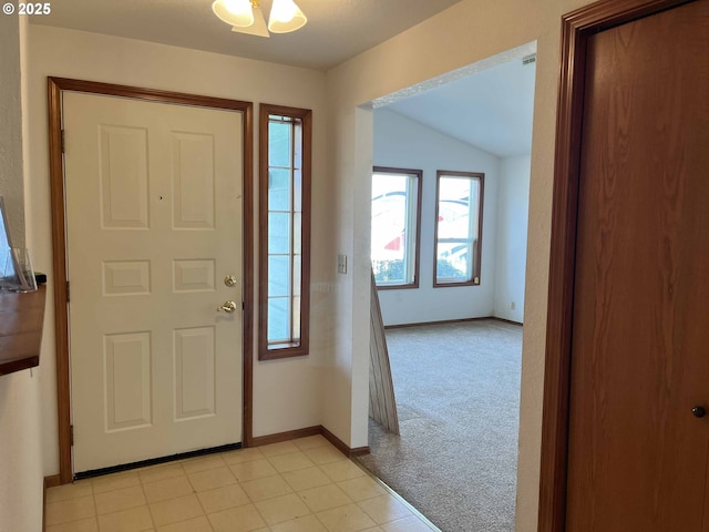 4040 Munsel Creek Dr, Florence, OR 97439 - entrance foyer with a textured ceiling, light tile patterned floors, and baseboards
