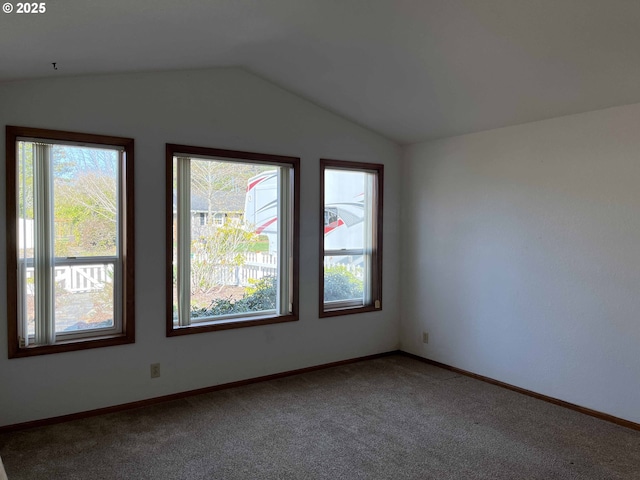 4040 Munsel Creek Dr, Florence, OR 97439 - carpeted empty room featuring lofted ceiling, a healthy amount of sunlight, and baseboards