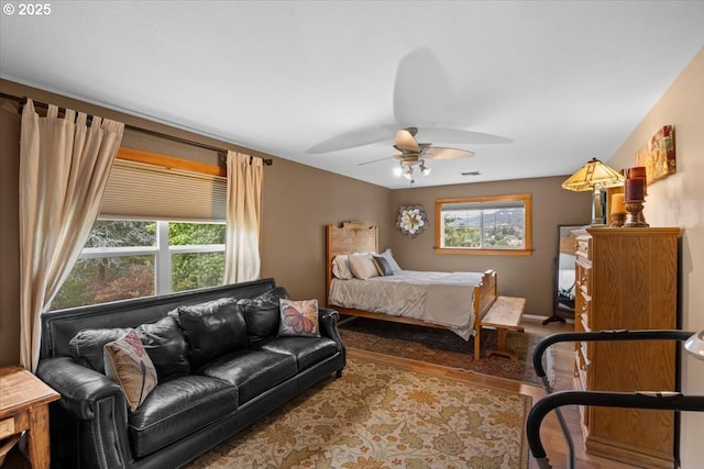 106 Green Valley Rd, Oakland, OR 97462 - bedroom featuring wood finished floors and a ceiling fan
