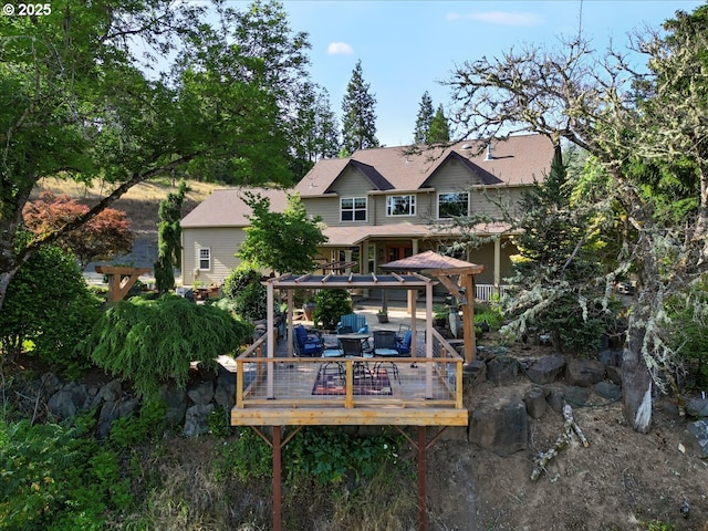 106 Green Valley Rd, Oakland, OR 97462 - rear view of property with a wooden deck and a gazebo