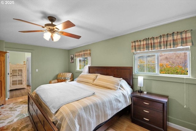 106 Green Valley Rd, Oakland, OR 97462 - bedroom with light wood-style floors and a ceiling fan