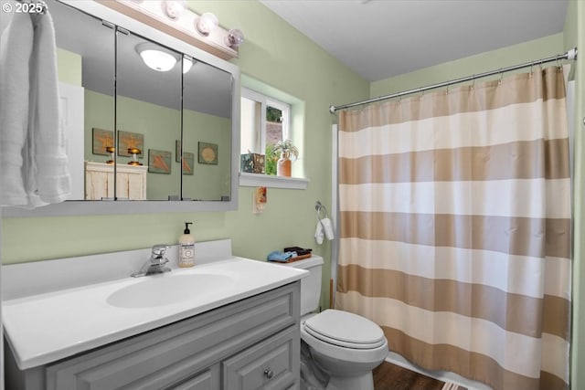 106 Green Valley Rd, Oakland, OR 97462 - full bath featuring vanity, curtained shower, and wood finished floors