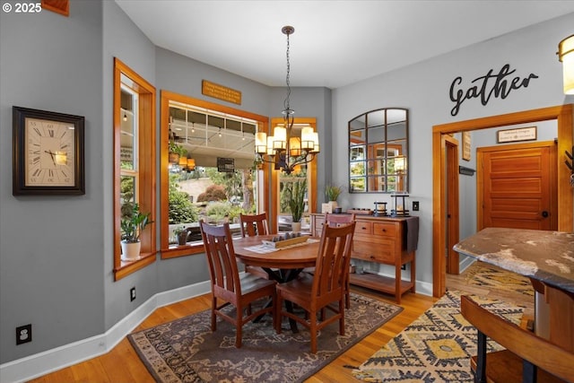 106 Green Valley Rd, Oakland, OR 97462 - dining room featuring a chandelier and light wood-style floors