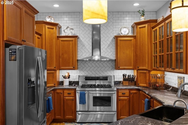 106 Green Valley Rd, Oakland, OR 97462 - kitchen with stainless steel appliances, wall chimney exhaust hood, decorative backsplash, brown cabinets, and recessed lighting