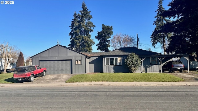 ranch-style home with a carport, a garage, and a front lawn