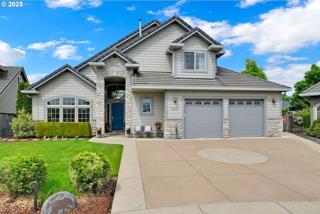 view of front facade featuring stone siding, concrete driveway, a front lawn, and a garage