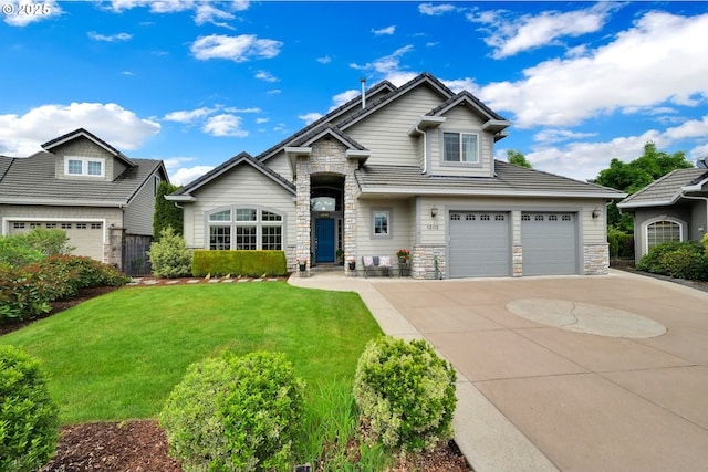view of front of property featuring stone siding, concrete driveway, and a front lawn