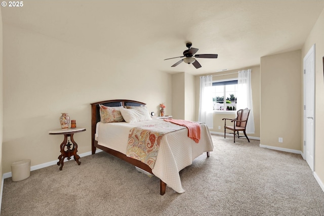 bedroom featuring carpet floors, baseboards, and ceiling fan