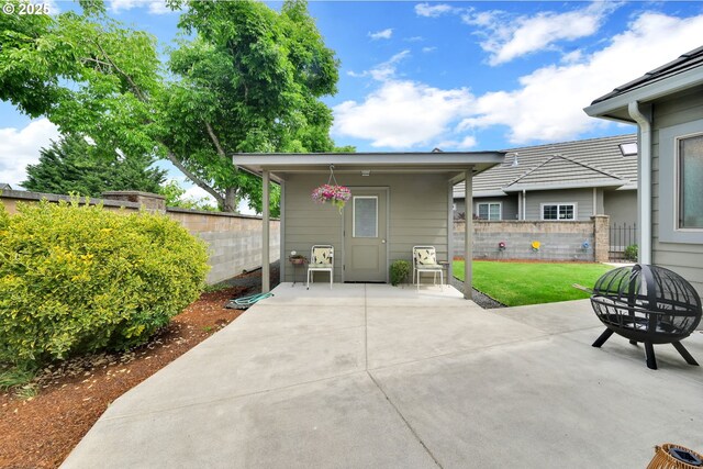 back of property with a patio area