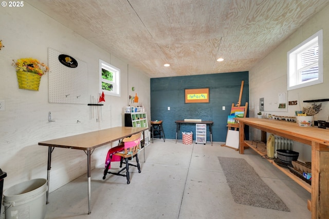 miscellaneous room featuring concrete floors and recessed lighting
