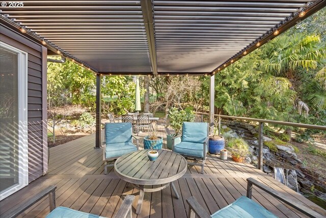 deck featuring outdoor dining area