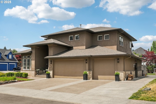 4706 NE 137th St, Vancouver, WA 98686 - prairie-style house with driveway, stucco siding, a garage, a gate, and a shingled roof