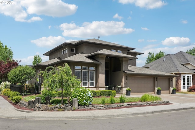 4706 NE 137th St, Vancouver, WA 98686 - prairie-style home featuring a garage, stucco siding, driveway, and roof with shingles