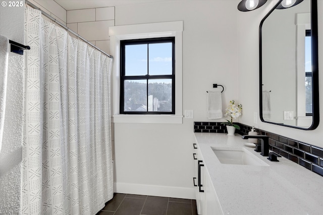 bathroom with vanity and tile patterned floors