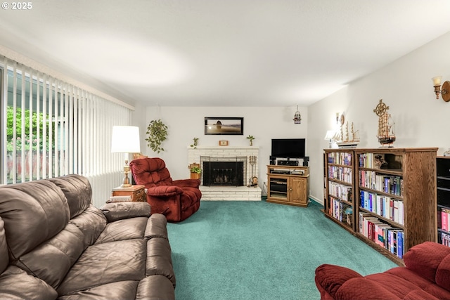 living area with carpet and a brick fireplace
