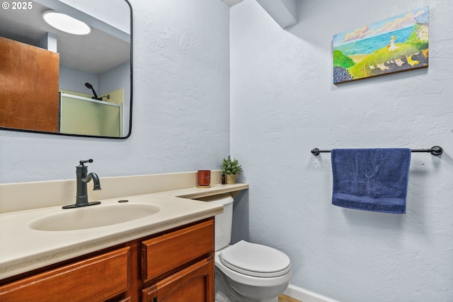 650 Harlow Rd Unit 233, Springfield, OR 97477 - bathroom with toilet, a shower stall, and vanity