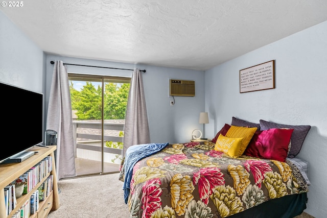 650 Harlow Rd Unit 233, Springfield, OR 97477 - carpeted bedroom featuring access to outside, a textured ceiling, and a wall mounted AC