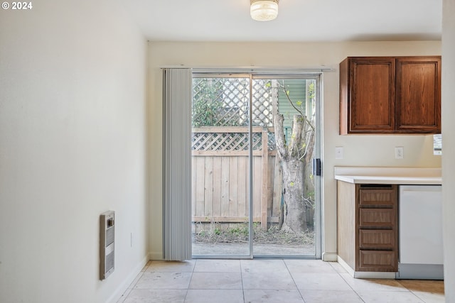 3103/3109 SE 6th Ave, Portland, OR 97202 - interior space with heating unit, light countertops, light tile patterned floors, and baseboards