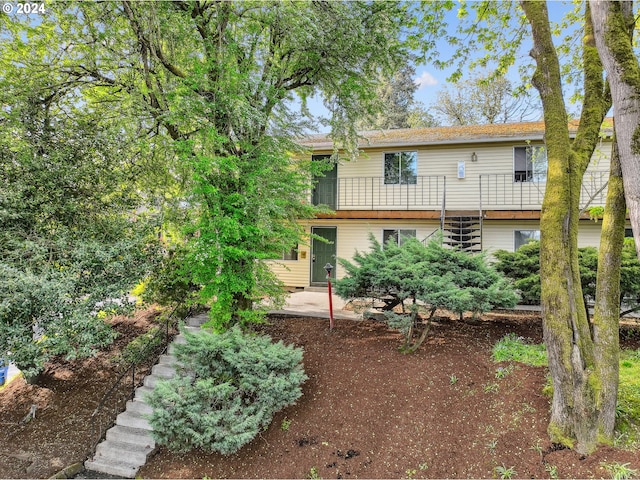 3103/3109 SE 6th Ave, Portland, OR 97202 - back of house with stairway and a patio