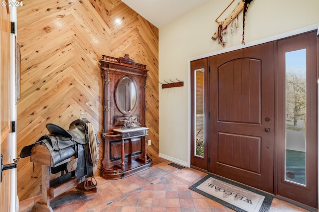 11 Deer Ridge Rd, Goldendale, WA 98620 - entryway with visible vents, baseboards, and wood walls