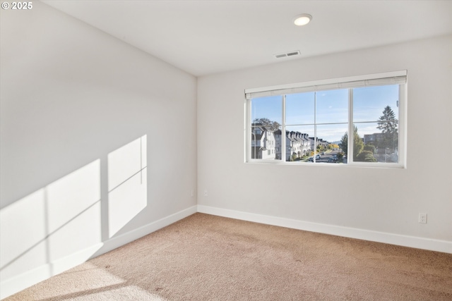 13020 SW Larkwood Pl, Sherwood, OR 97140 - unfurnished room with light carpet, recessed lighting, and baseboards