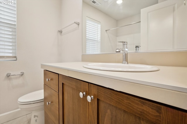 full bath featuring visible vents, walk in shower, toilet, tile patterned floors, and vanity