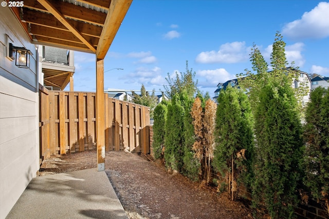 view of yard featuring a patio and a fenced backyard