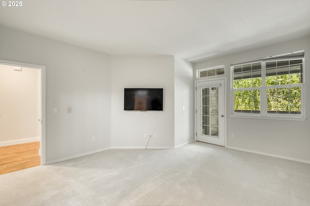 4630 Summerlinn Way W, Linn, OR 97068 - unfurnished living room featuring carpet flooring and baseboards