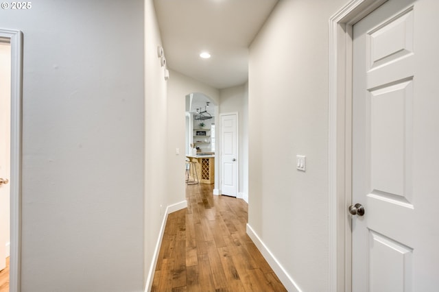 4630 Summerlinn Way W, Linn, OR 97068 - hall with light wood-type flooring, arched walkways, and recessed lighting