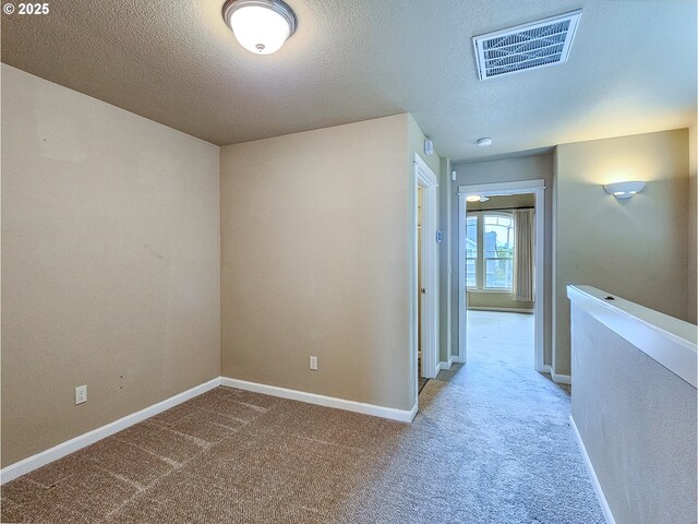 15621 SE Eckert Ln, Damascus, OR 97089 - kitchen with stainless steel appliances, light brown cabinets, a chandelier, a breakfast bar area, and wood finished floors