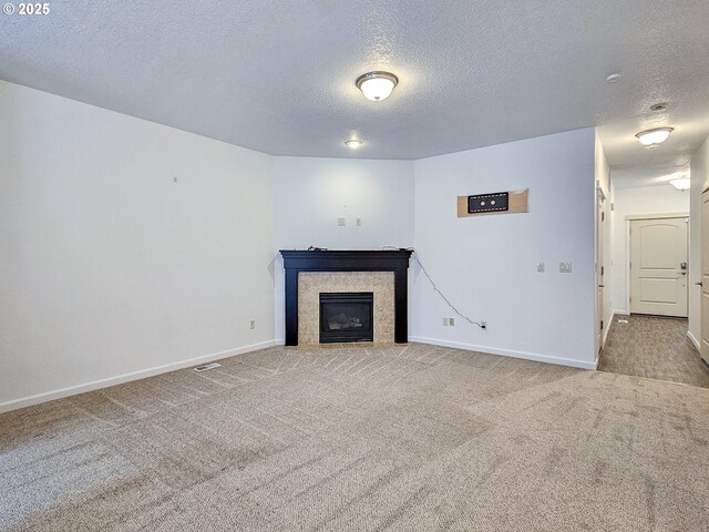 15621 SE Eckert Ln, Damascus, OR 97089 - staircase with carpet floors, a textured ceiling, and baseboards