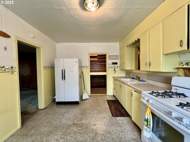 524 Buckhorn Rd, Roseburg, OR 97470 - kitchen with light countertops, a sink, light floors, and white appliances