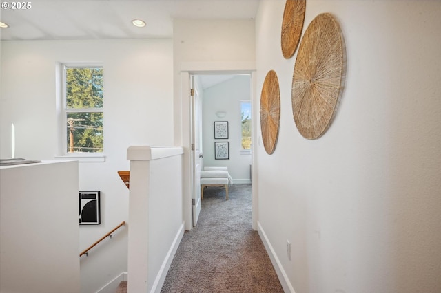 corridor featuring carpet flooring