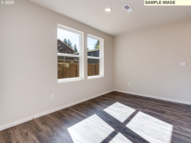bedroom with baseboards and light carpet