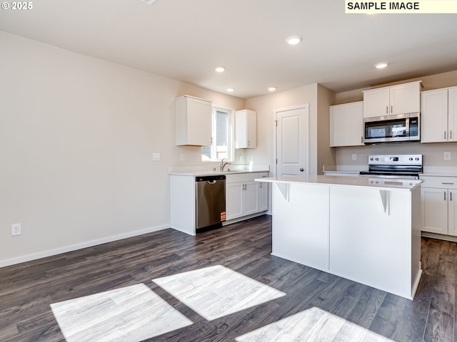 full bathroom with tub / shower combination, wood finished floors, toilet, and vanity