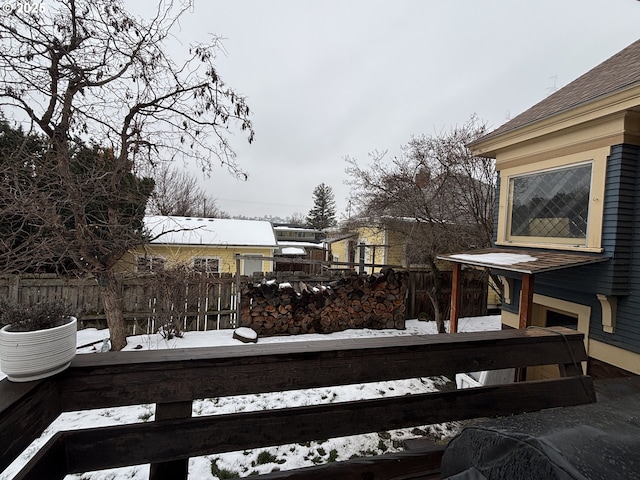 view of snow covered deck