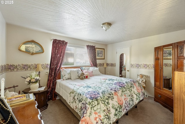 bedroom featuring carpet