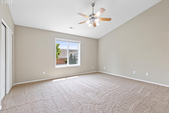 18407 NE 20th St, Vancouver, WA 98684 - unfurnished bedroom with carpet, baseboards, a closet, a ceiling fan, and vaulted ceiling