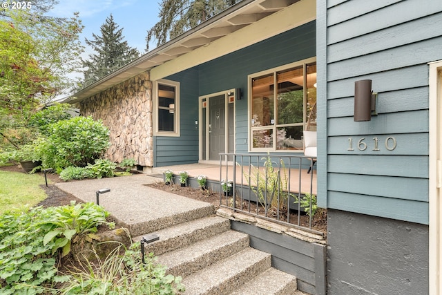 doorway to property with a porch