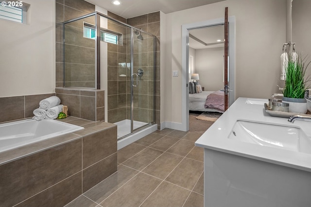 15192 SW Huntwood St, Tigard, OR 97224 - ensuite bathroom featuring a stall shower, a garden tub, double vanity, tile patterned floors, and plenty of natural light
