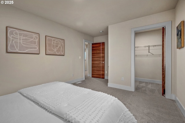 15192 SW Huntwood St, Tigard, OR 97224 - bedroom with carpet flooring, a walk in closet, and a closet