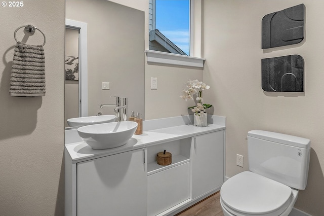15192 SW Huntwood St, Tigard, OR 97224 - bathroom with double vanity and wood finished floors